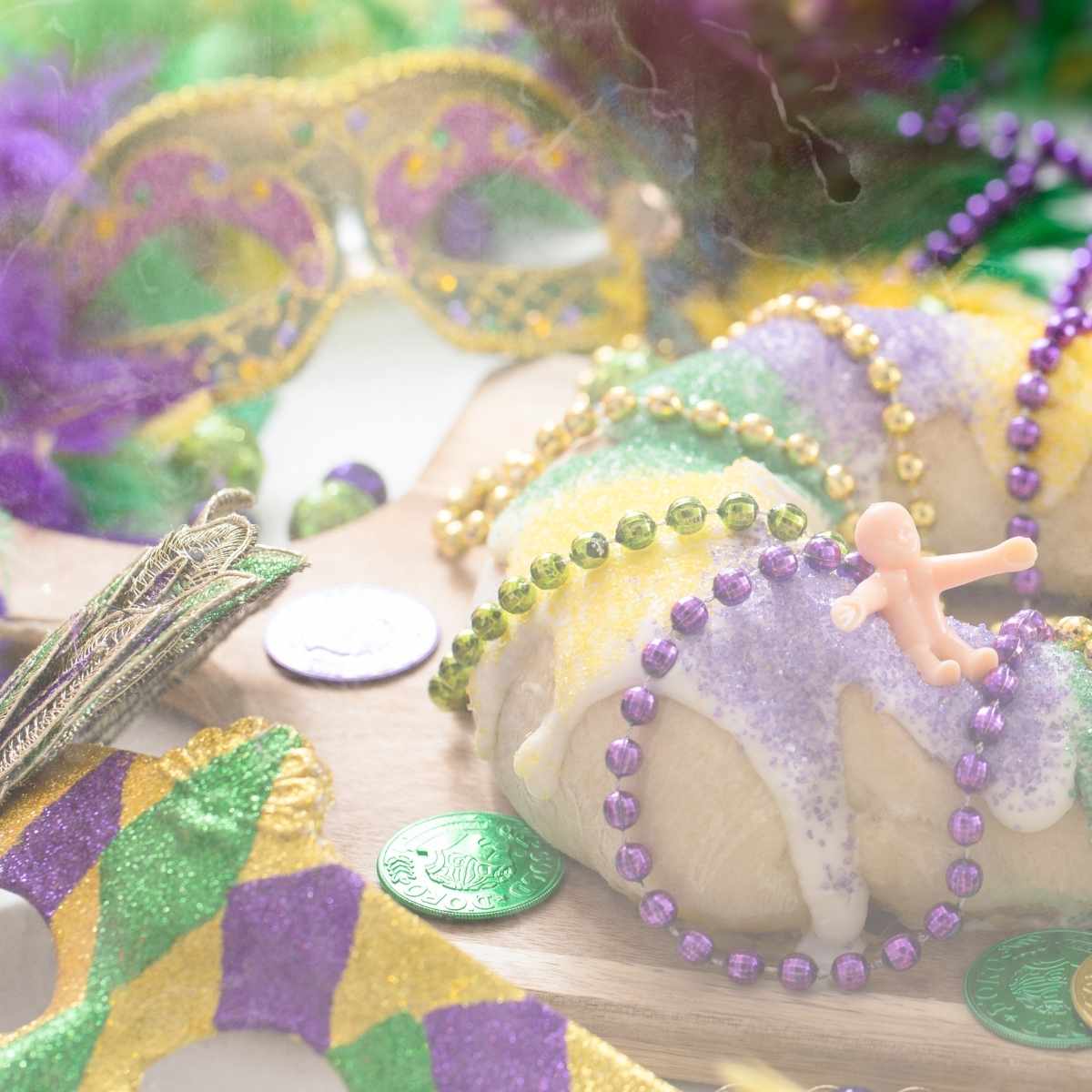 Mardi Gras scene with mask and King cake