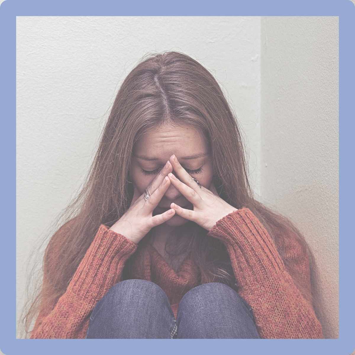 woman praying in agony