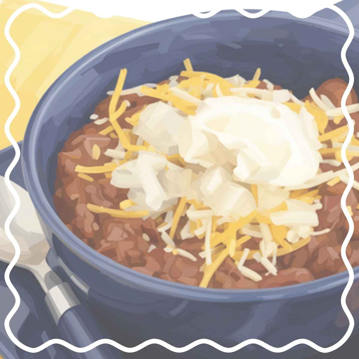 a bowl of chili wiht cheese and sour cream